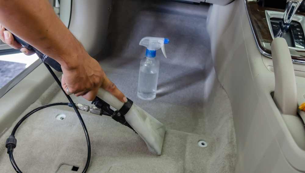Start the steamer to clean your car carpets